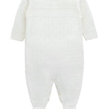 A knit footed jumpsuit or onesie with geometric patterns; cozy baby boy clothes, perfect for baby registry and Christmas gift ideas 