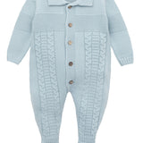 A knit footed jumpsuit or onesie with geometric patterns; cozy baby boy clothes, perfect for baby registry and Christmas gift ideas 