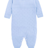 A knit footed jumpsuit or onesie with geometric patterns; cozy baby boy clothes, perfect for baby registry and Christmas gift ideas 